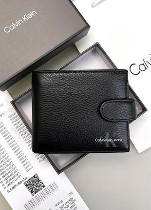 Шкіряний гаманець чоловічий чорний calvin klein брендовий портмоне на кнопці з натуральної шкіри
