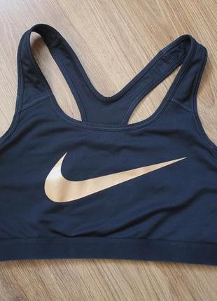 Топ nike pro classic swoosh gold bra2 фото