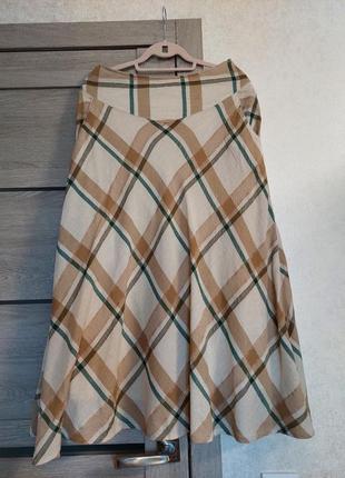 Восхитительная бежевая  юбка миди🔹а-силуэта, в вертикальный коричневый принт marie mero(размер 36-38)3 фото