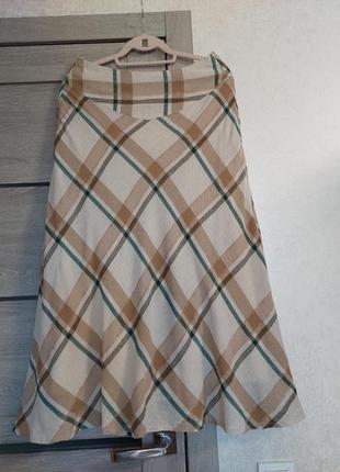 Восхитительная бежевая  юбка миди🔹а-силуэта, в вертикальный коричневый принт marie mero(размер 36-38)7 фото
