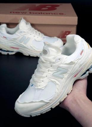 Жіночі кросівки new balance 2002r cream нью беланс кремового кольору