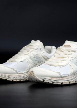 Жіночі кросівки new balance 2002r cream нью беланс кремового кольору6 фото