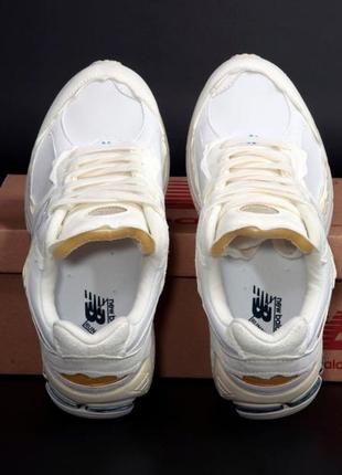Жіночі кросівки new balance 2002r cream нью беланс кремового кольору4 фото