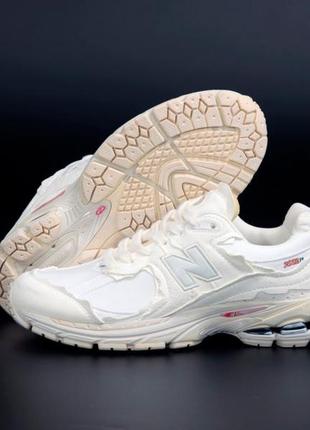 Жіночі кросівки new balance 2002r cream нью беланс кремового кольору3 фото