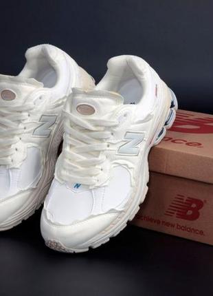 Жіночі кросівки new balance 2002r cream нью беланс кремового кольору2 фото