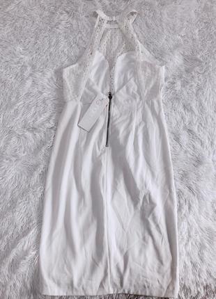 Стильне біле плаття з імітацією запаху і відкритою спиною ginger crowns6 фото