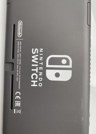 Портативна ігрова приставка nintendo switch lite (grey)5 фото