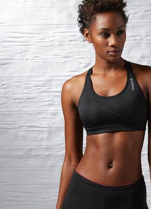 Топ reebok womens running essentials sports bra