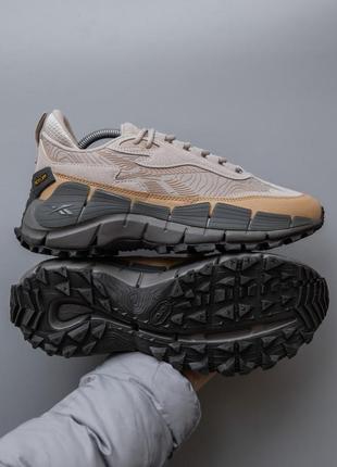 Чоловічі кросівки бежеві з сірим reebok zig kinetica 2.5 edge3 фото