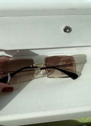 Нові коричневі жіночі окуляри1 фото