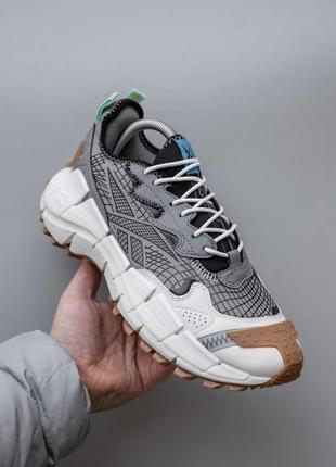 Чоловічі кросівки сірі з  білим reebok zig kinetica 2.5 edge5 фото