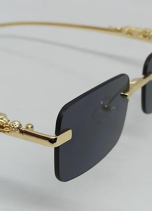 Сонцезахисні окуляри унісекс модні чорні вузькі безоправні з золотим металевим ягуаром