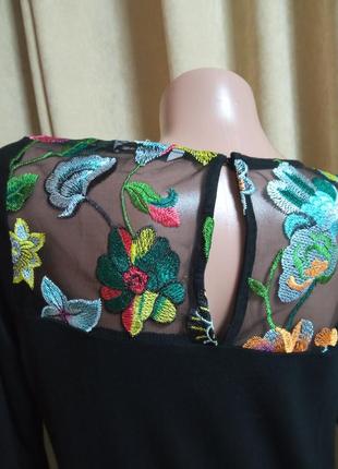 Трикотажна блузка з вишивкою4 фото