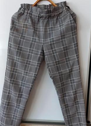 Брюки жіночі в клітинку