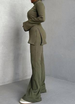 Женский прогулочный костюм кофточка с разрезом длинный рукав клеш+штаны книзу клеш размеры 42-48