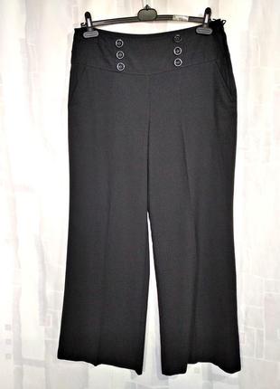Элегантные широкие брюки  из фактурной ткани с кокеткой5 фото
