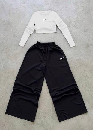 Костюм спортивний жіночий: топ з рукавами + штани вільного крою на високій посадці зі значком «nike» чорний білий стильний якісний