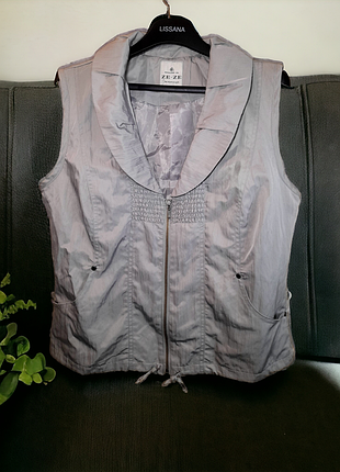 Новий жіночий жилет