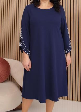 Сукня жіноча темно синього кольору1 фото