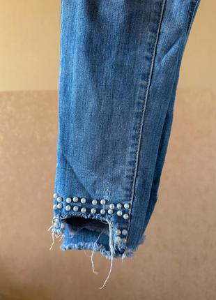 Світлі жіночі джинси