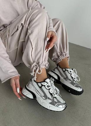 Трендові кросівки еко білі зі срібним10 фото