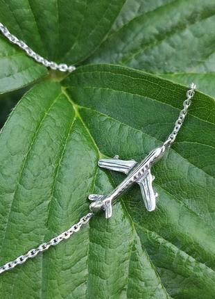 Серебряный колье самолет