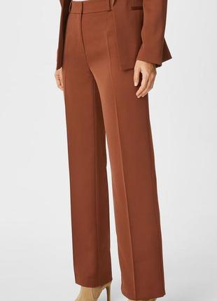 Брендовые стильные брюки с карманами yessica by c&a этикетка