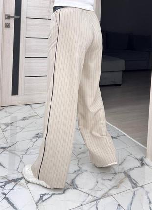 Неймовірна новинка !
тренд цього року! 
класичні широкі штани палаццо у смужку зі шкіряним кантом.9 фото