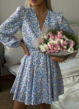 Неймовірно жіночна сукня з квітковим принтом на запах коротка приталена спідниця вільного крою з рукавами ліхтариками9 фото