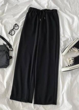 Спортивні штани вільного крою на високій посадці прямі широкі джогери на резинках стильні базові чорні сірі1 фото