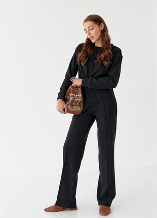 Жіночий трикотажний костюм чорного кольору з джемпера та штанів, розміри 42 44 46 48