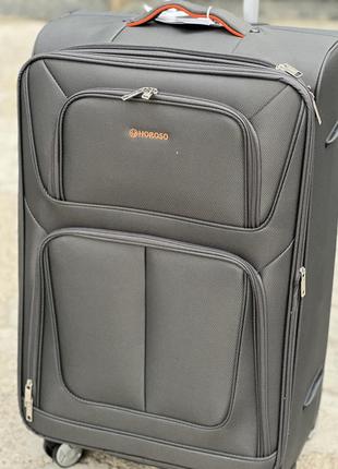 Средний чемодан дорожный тканевый m horoso на колесах  с подшипником 4 колеса7 фото