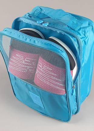 Чохол-сумка блакитного кольору для зберігання і пакування взуття1 фото