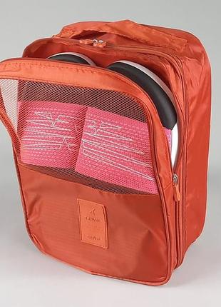 Чехол-сумка оранжевого цвета для хранения и упаковки обуви1 фото
