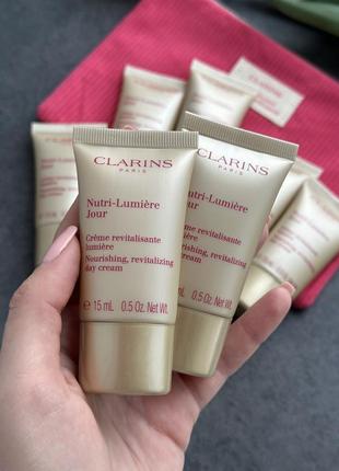 Денний омолоджувальний крем clarins nutri-lumière day cream.2 фото