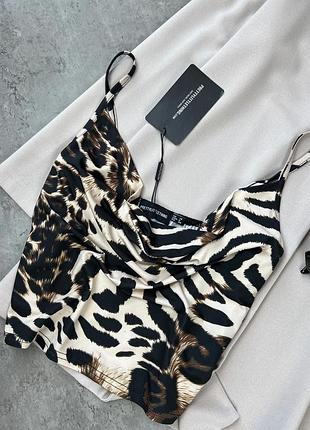 Топ plt в принт з навісним хомутом ( на ньому тканина подвійна) приємна на дотик 100% поліестр