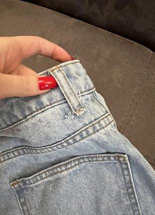 Жіночі блакитні прямі джинси з розривами від booho10 фото