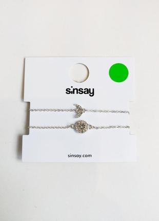 Комплект сріблястих браслетів sinsay