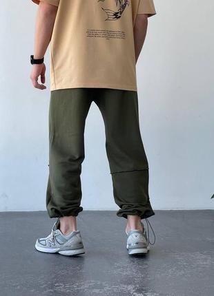 Чоловічі широкі спортивні штани мом на весну/осінь на утяжках хакі7 фото