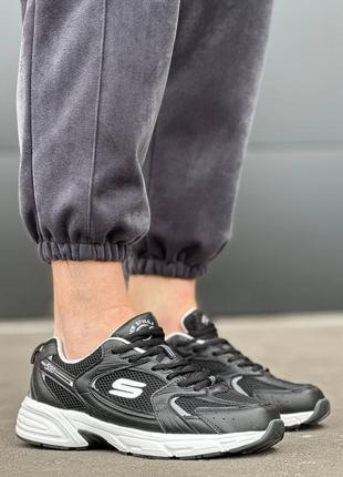 Чоловічі кросівки чорні шкіряні демісезонні3 фото