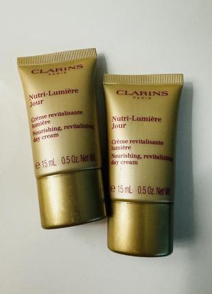 Денний омолоджувальний крем clarins nutri-lumiere 15 мл1 фото