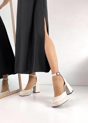 Бежеві туфлі із натуральної шкіри