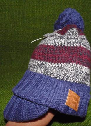 Теплая полосатая шапка с козырьком reserved.размер-1-4г. новая.2 фото