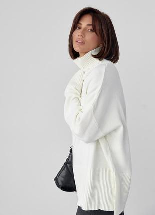 Женский вязаный свитер oversize с разрезами по бокам - молочный цвет, s (есть размеры)9 фото
