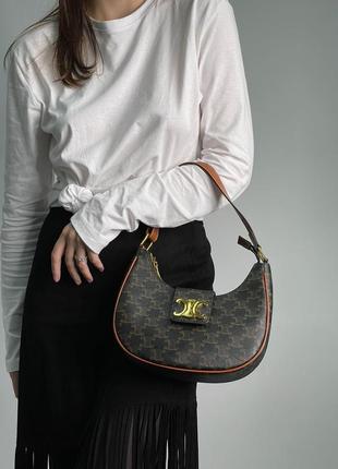 Жіноча сумка 👜 celine medium ava triomphe bag in triomphe canvas and calfskin tan