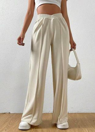 Стильные женские широкие трикотажные брюки в стиле палаццо