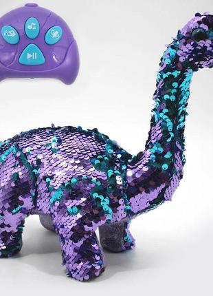 М'яка іграшка динозавр на радіокеруванні в паєтках повторюшка на батарейках2 фото