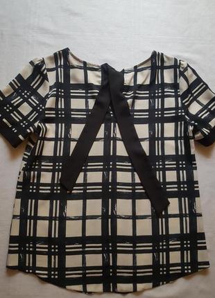 Блуза  с завязкой на спинке 12 р-ра.4 фото