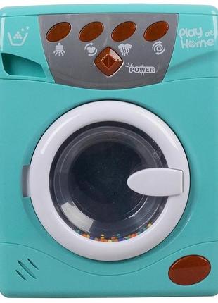 Игрушка стиральная машинка с крутящимся барабаном световые и звуковые эффекты4 фото
