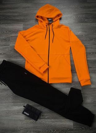 Костюм помаранчевий-чорний intruder 'космо'